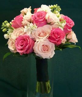 Darker and lighter pink roses bridesmaid