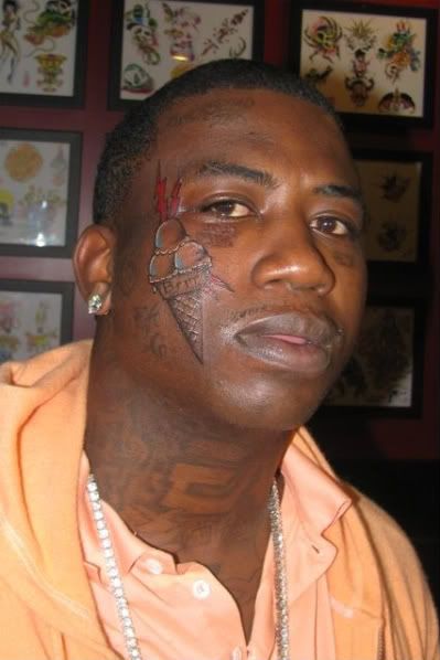 gucci mane new tattoo. Gucci Mane is backing up his